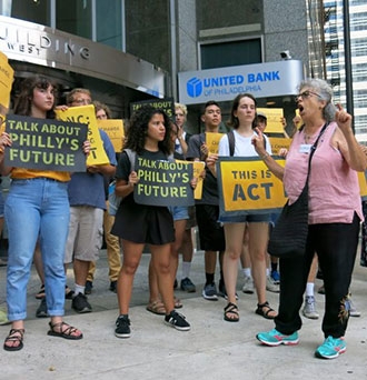 The Sunrise Movement organized protests like this one in July 2019 in Philadelphia to pressure the Democratic National Committee to hold a primary debate focused on climate change. (Jeff Brady/NPR)