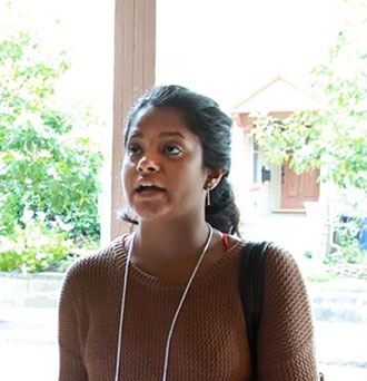 Environmental Voting Project canvasser Heleena Mathew spoke with a Green Street resident. JOHN BLANDING/BOSTON GLOBE