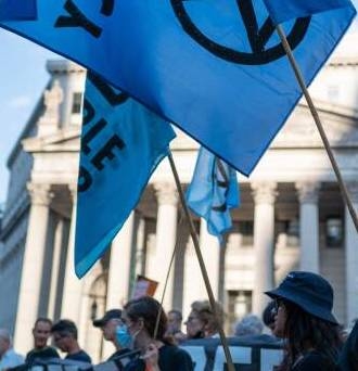 Climate activists, including members of Extinction Rebellion, participate in a demonstration in front of the Thurgood Marshall US Courthouse against a recent Supreme Court ruling on June 30, 2022 in New York City.